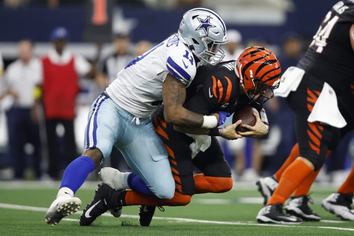 Sep 18, 2022; Arlington, Texas, USA; Dallas Cowboys linebacker Micah Parsons (11) sacks Cincinnati Bengals quarterback Joe Burrow (9) in the third quarter at AT&T Stadium. Mandatory Credit: Tim Heitman-USA TODAY Sports